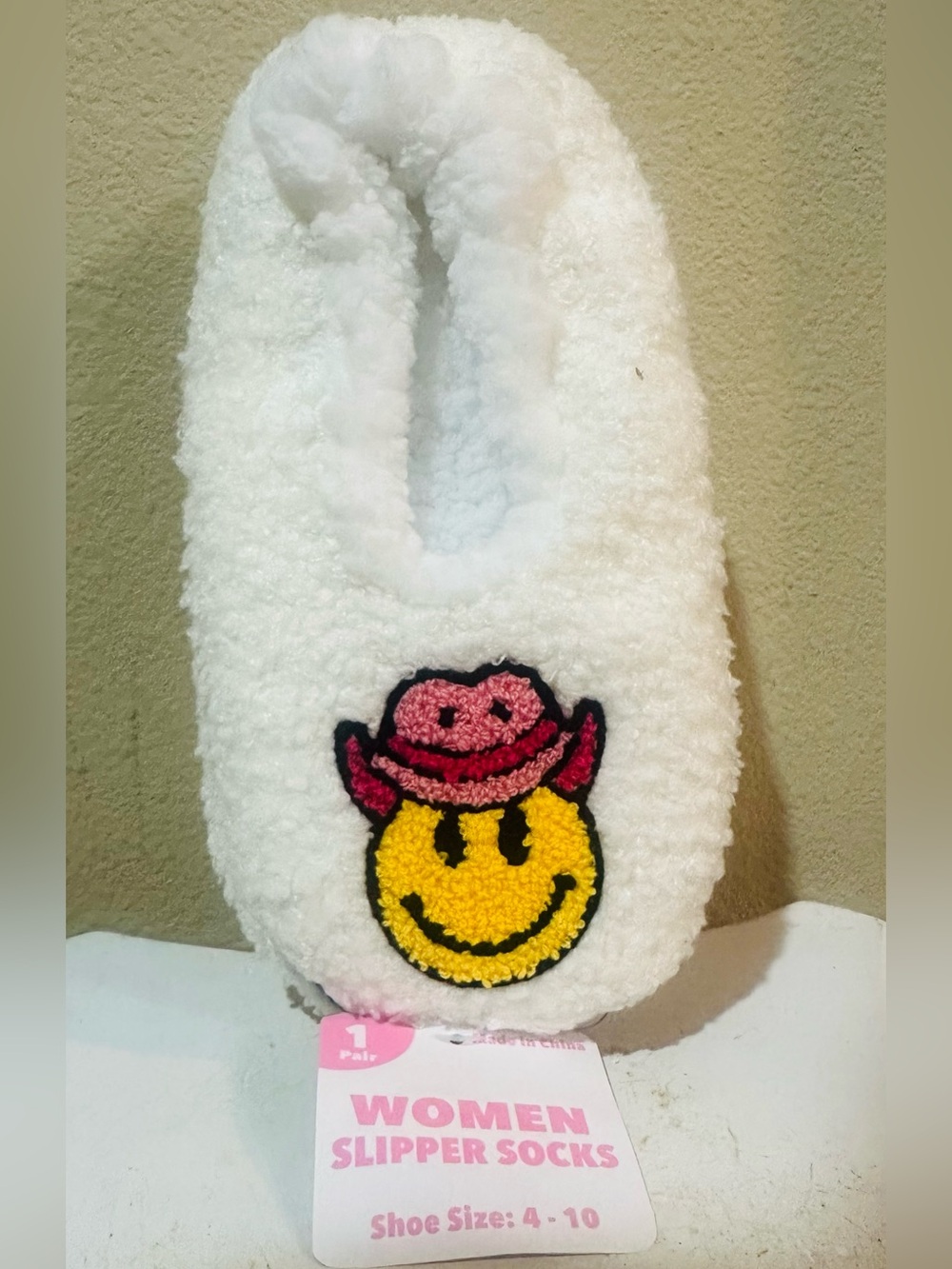 Women’s White Plush Slipper Socks with Yellow Smiley and Pink Hat Patch